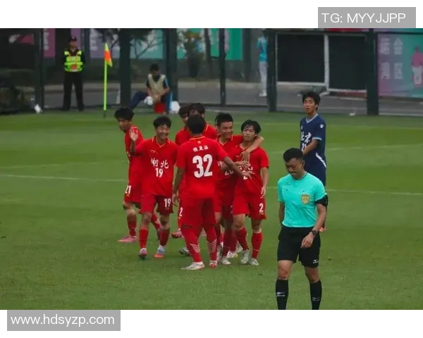 全运男足半决赛迎来精彩对决，广东湖北双双晋级，激情点燃绿茵赛场